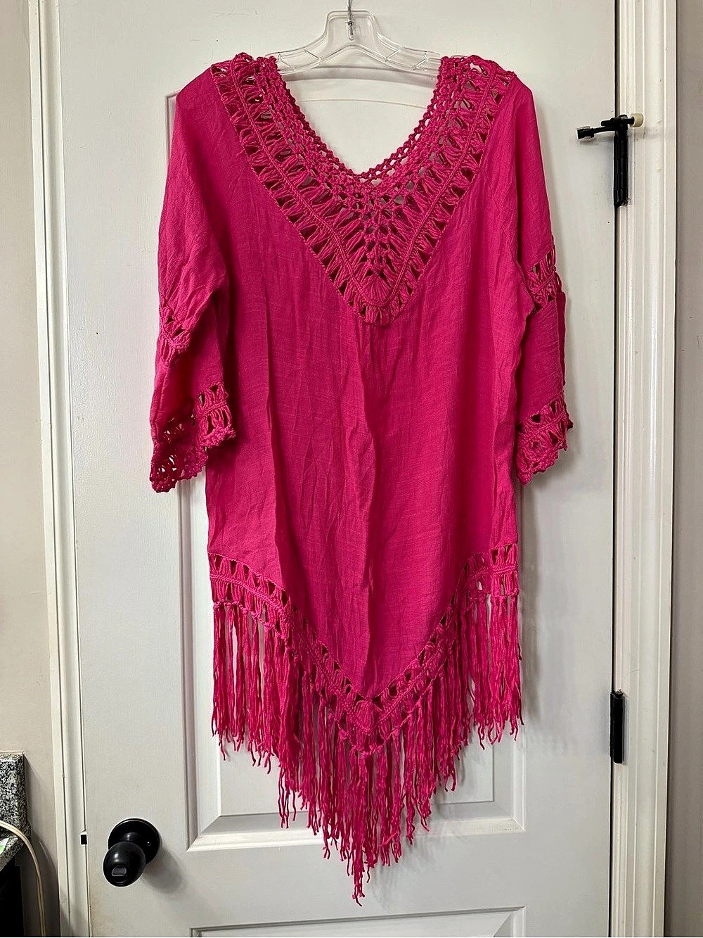 Pink Fringe V-Neck Coverup
New Without Tags
Women’s One Size Fits Most